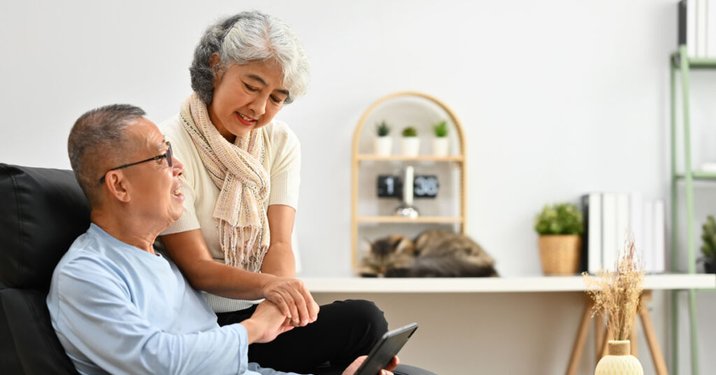 Image of a senior couple being happy in a safe home