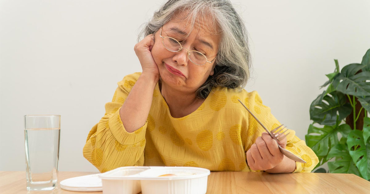 Senior woman having loss of appetite and become unhappy