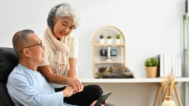 Image of a senior couple being happy in a safe home