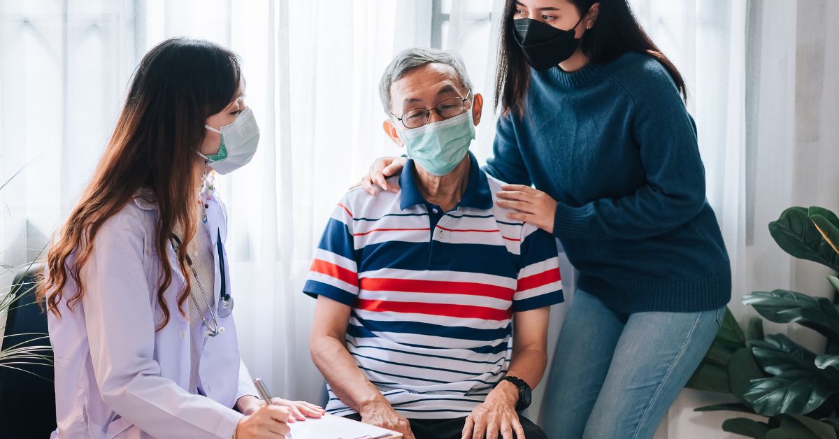 Image of an adult accompanying her elderly parent to consult a doctor. The elderly parent is suspected to be having dementia