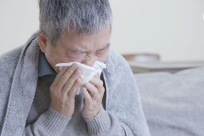 senior citizen having influenza, also known as the flu