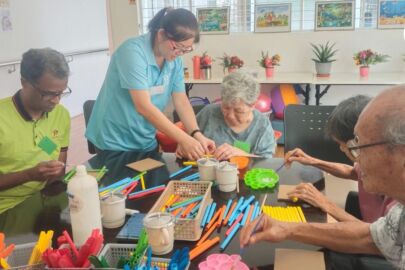 Seniors doing cognitive activities together at the senior daycare