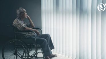 A lonely elderly man in an empty house during festive period