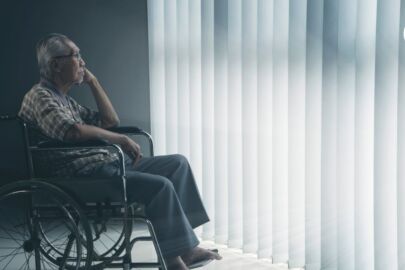 A lonely elderly man in an empty house during festive period