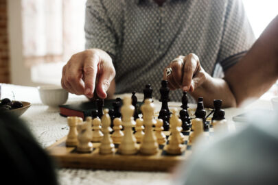 senior concierge accompanying an elderly for outings, board games, conversations, or movie trips