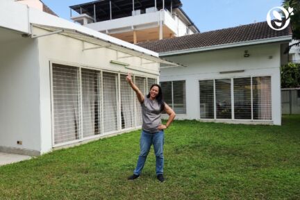 Founder of Oretha's Senior Daycare standing in front of the second senior daycare, in Taman Billion, Cheras